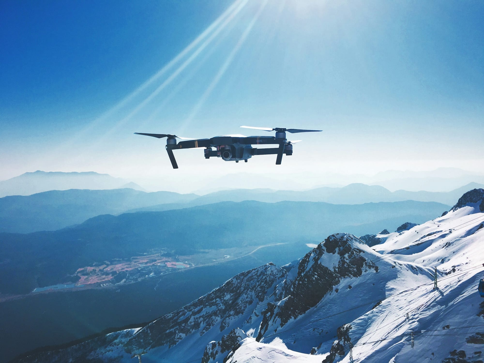 A survey UAV in flight, used for detailed corridor acquisition over short spans.
